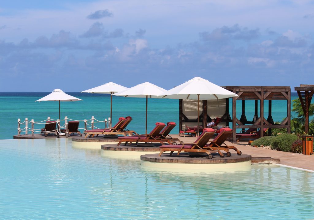 Salt water infinity pool in Zanzibar Tanzania beach blue